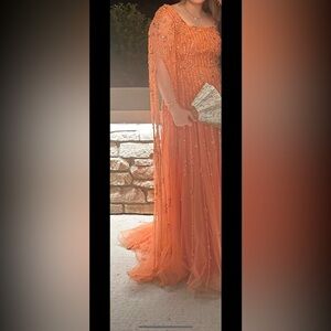 Enchanting Elegance: Mohammed Murad's Peach Orange Masterpiece